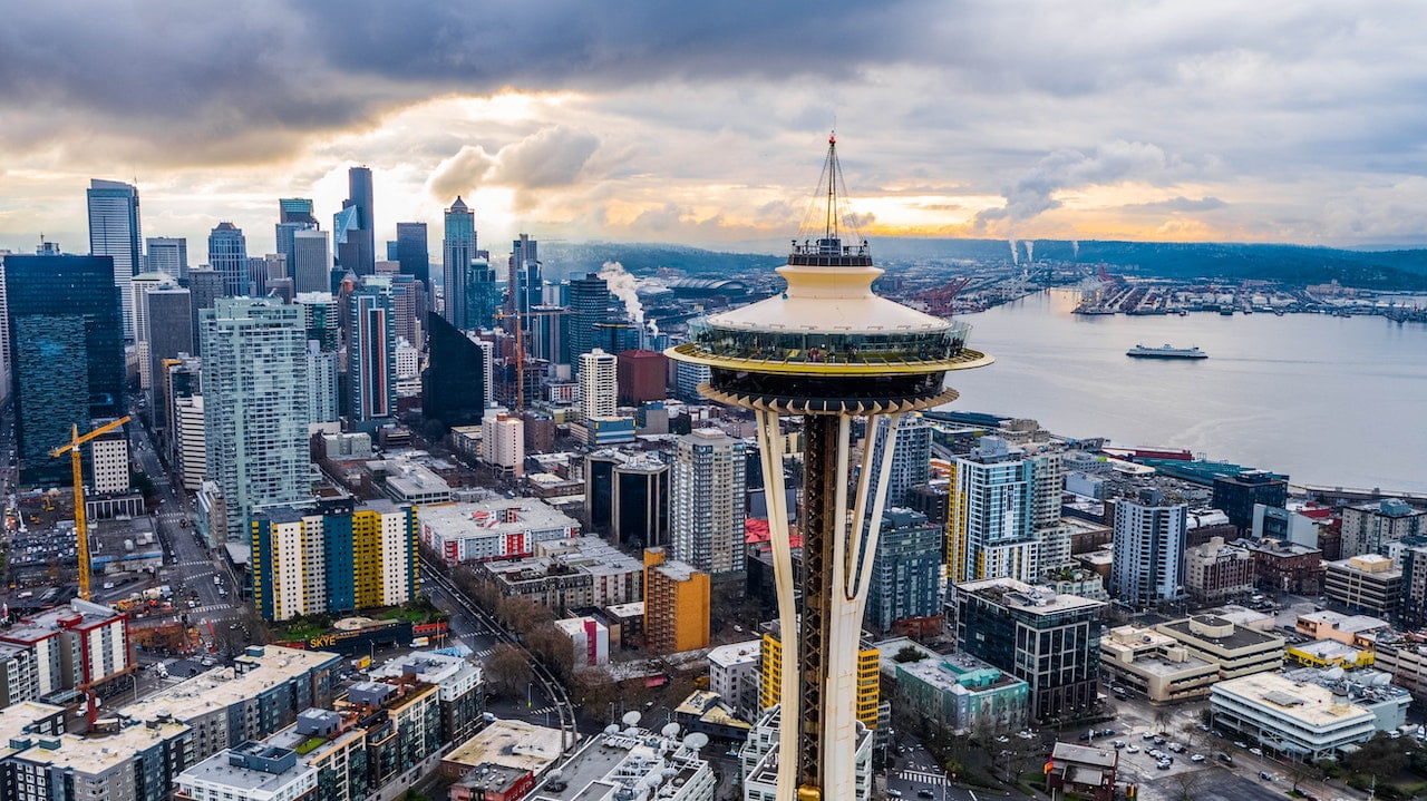 Space Needle with a backdrop of Seattle city skyline